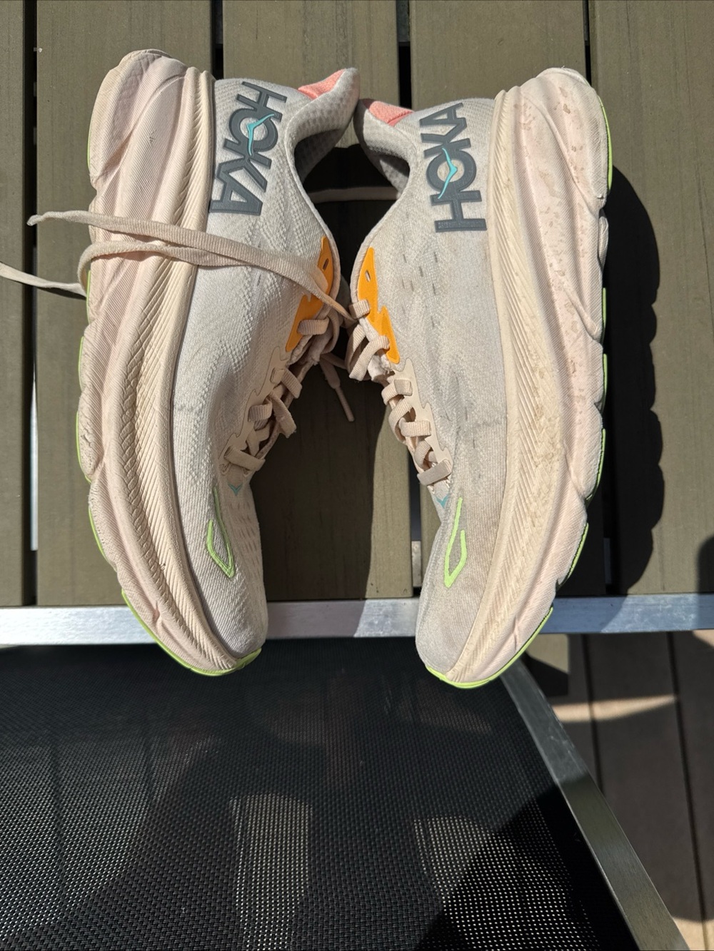 Hoka Neutral Trainer in Cream colored with Neon Accents